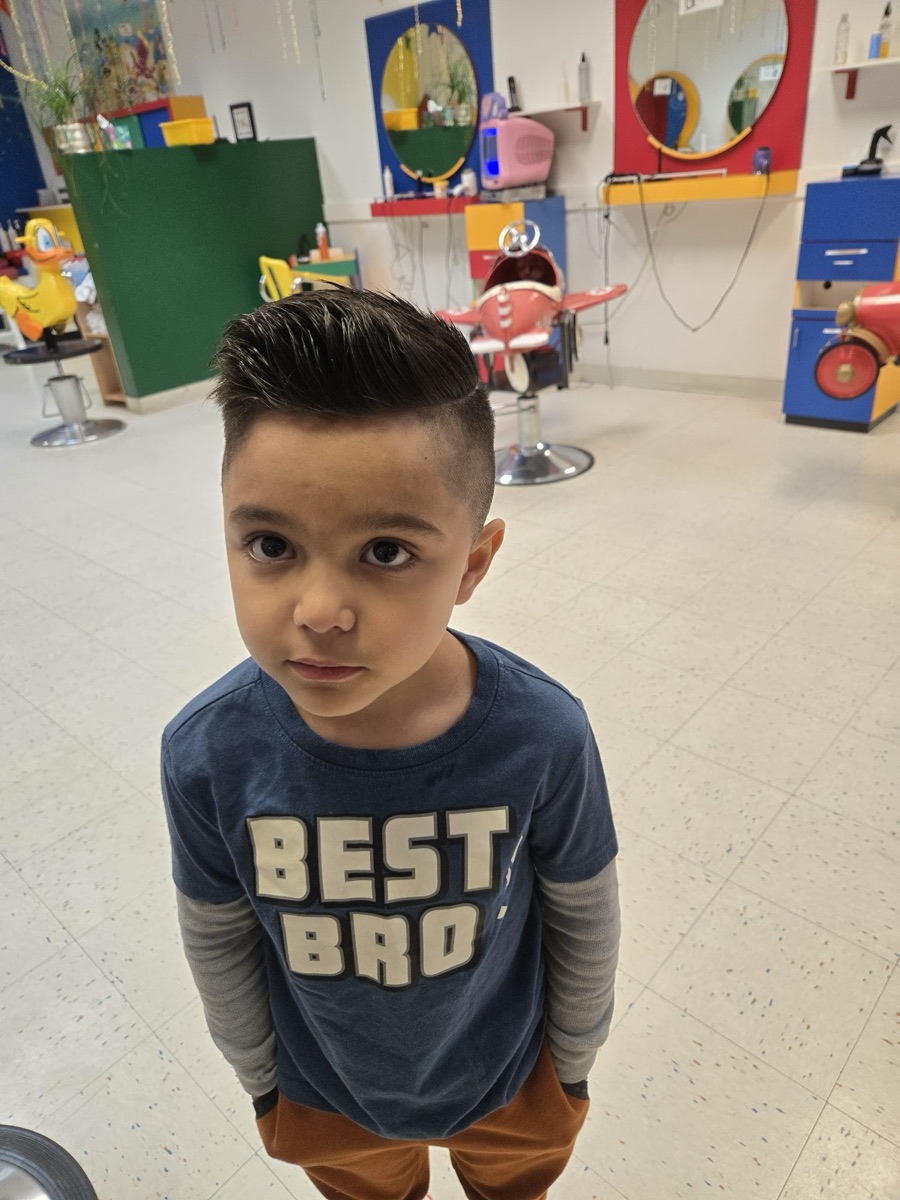 A boy with a short spiky cut