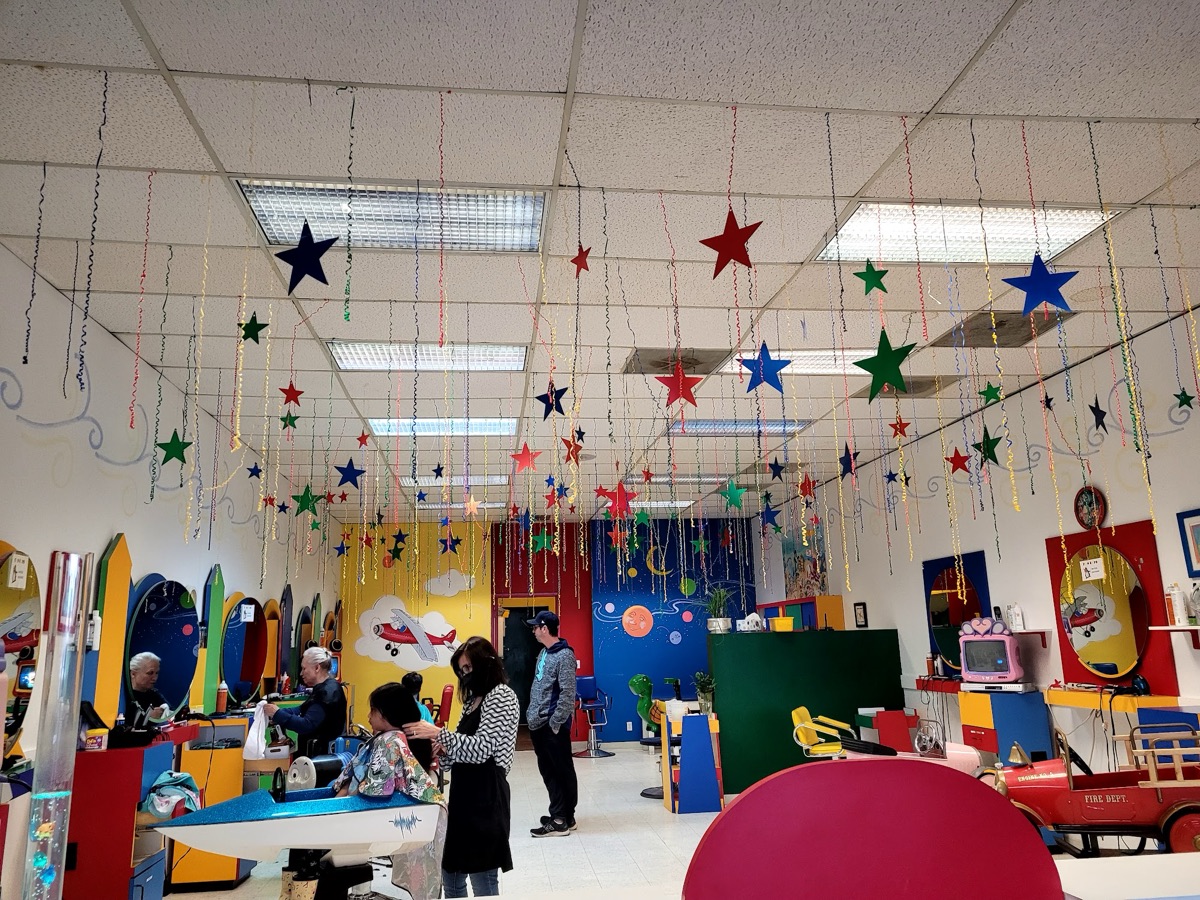 Inside the salon, with stars hanging from the ceiling